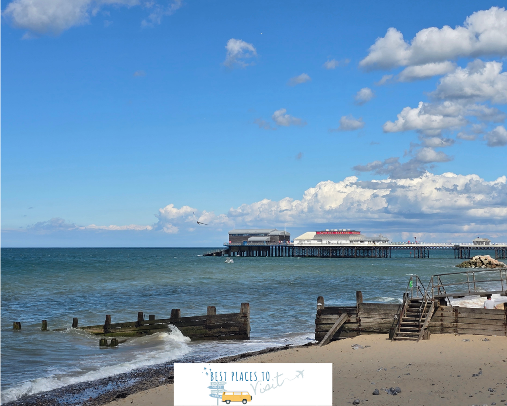 View of Cromer Pier from the sandy beach in North Norfolk